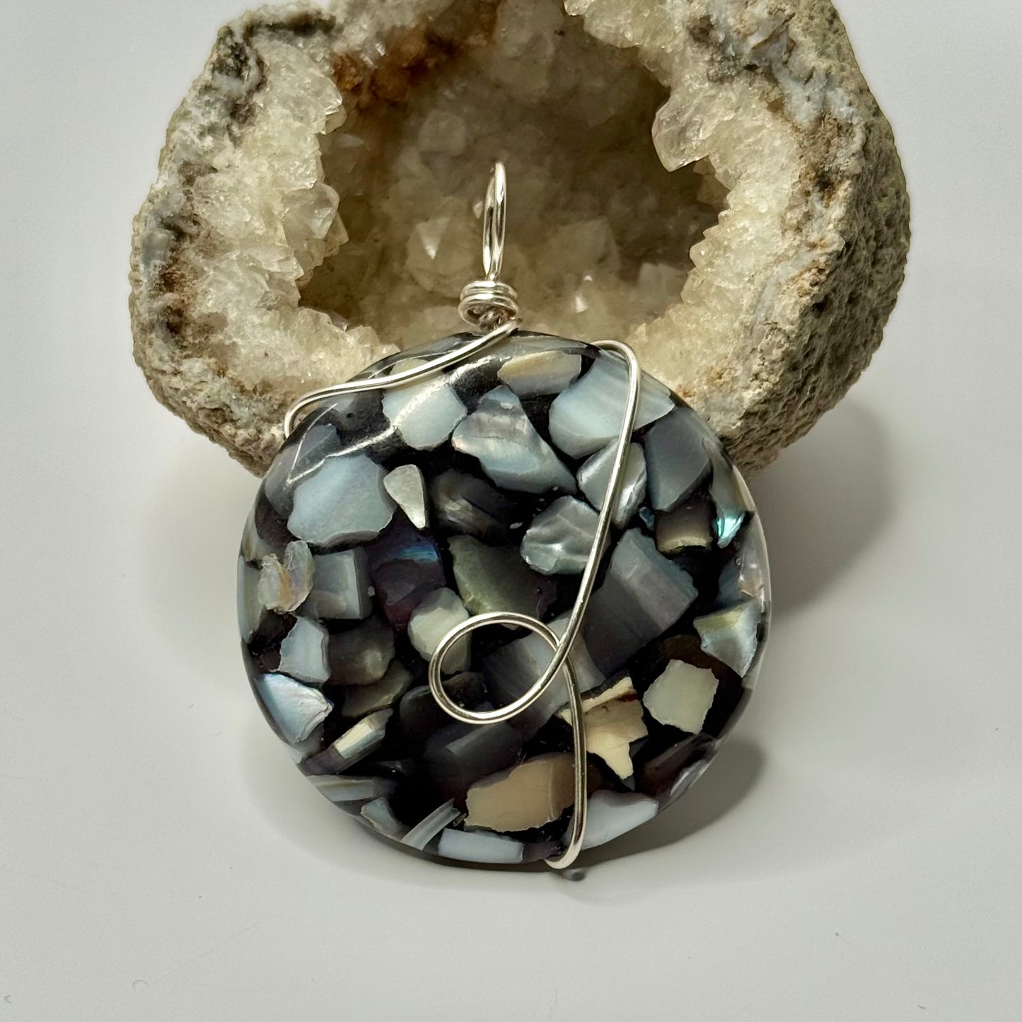Silver Seashell and Obsidian Pendant