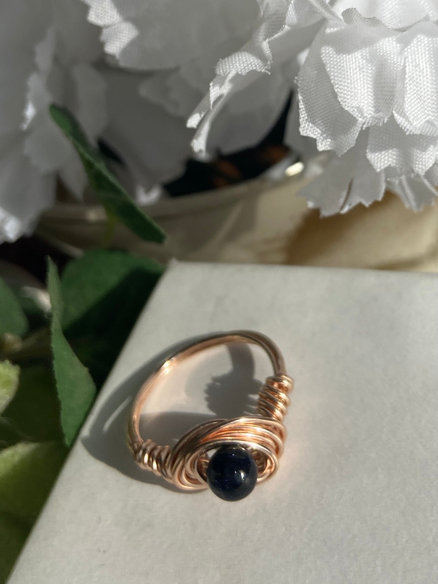 Blue Goldstone ring with rose gold wire wrapping