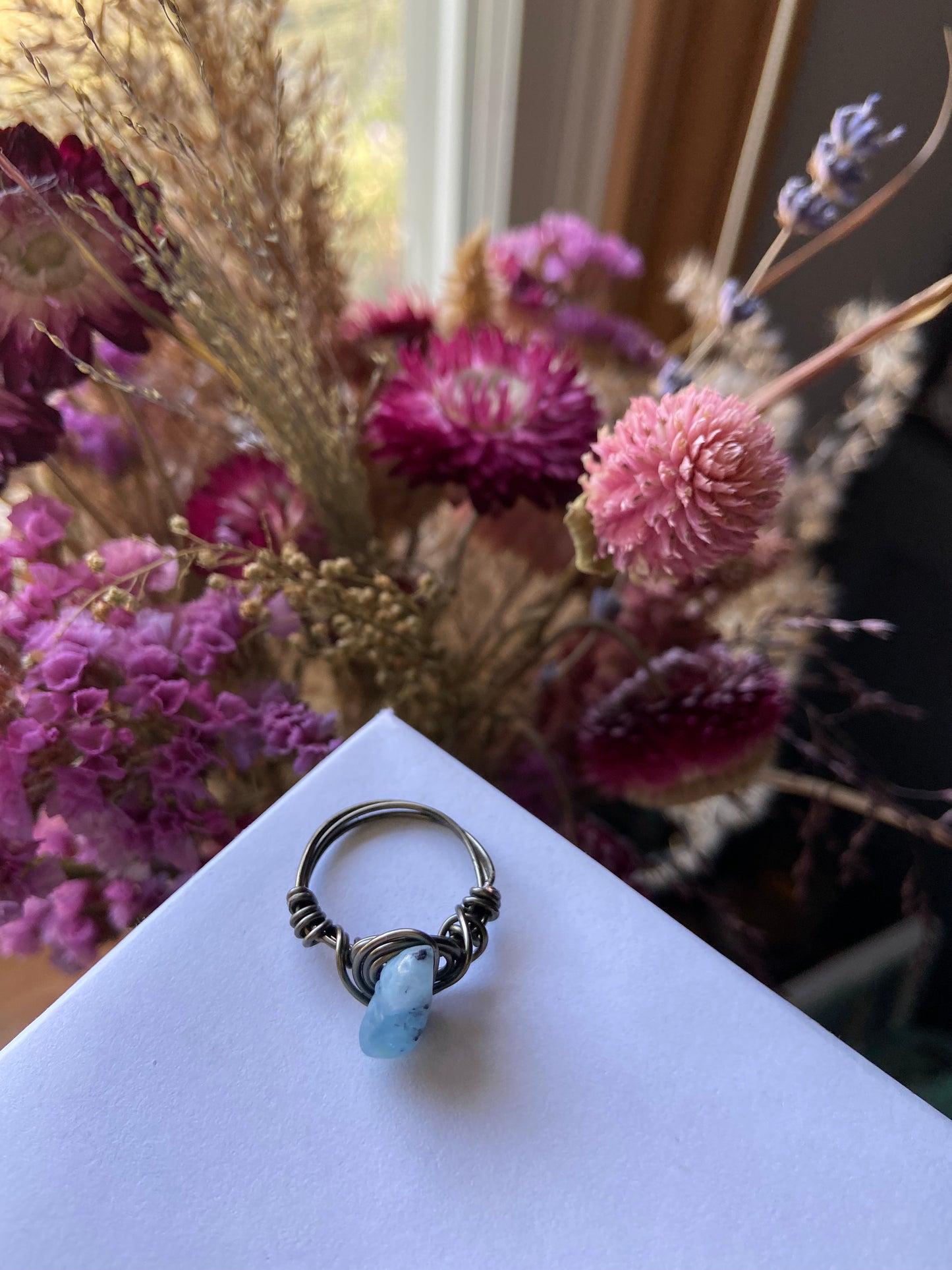 Blue Calcite ring with charcoal-colored wire wrapping