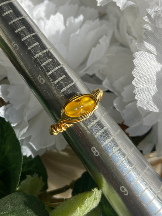 Citrine ring with gold wire wrapping