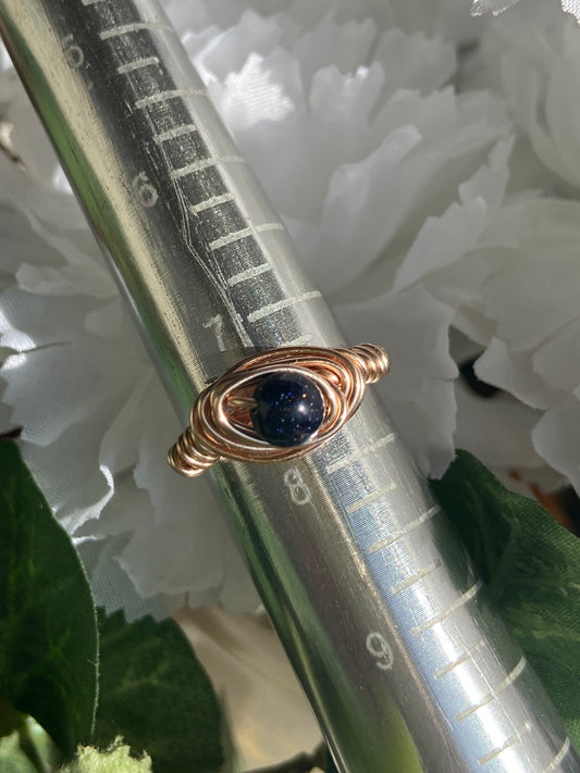 Blue Goldstone ring with rose gold wire wrapping