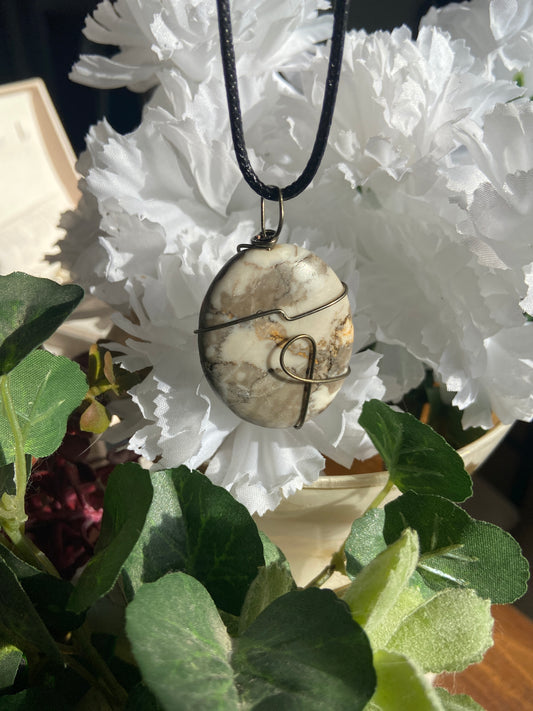 Marble necklace with charcoal-colored wire wrapping